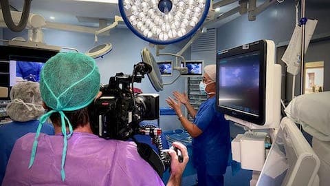 cameraman filming during surgery
