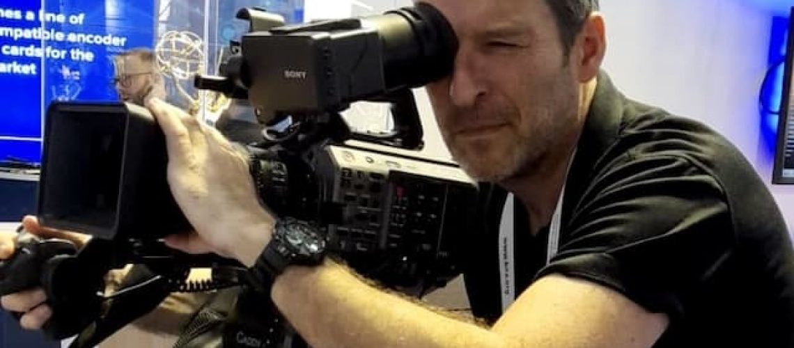 Camera operator filming on a trade fair in Barcelona